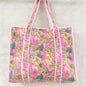 Floral patterned tote bag on a light background