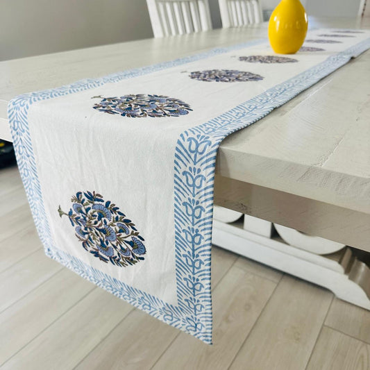 Table runner with floral patterns on a dining table