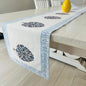 Table runner with floral patterns on a dining table