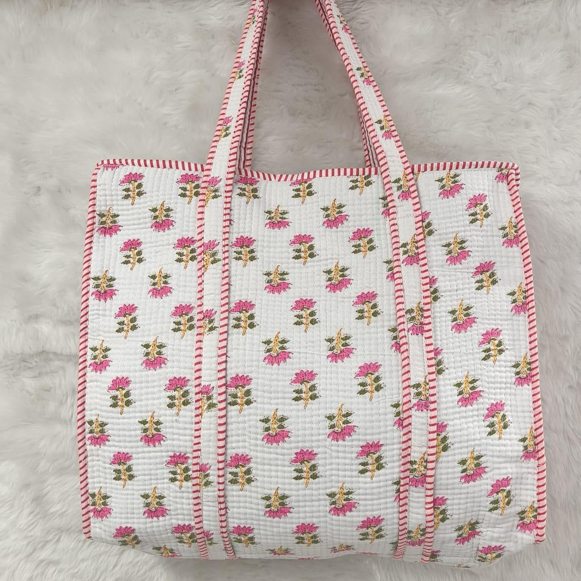 Floral patterned tote bag on a gray background
