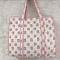 Floral patterned tote bag on a gray background