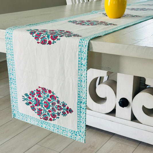 Table runner with floral design on a wooden table