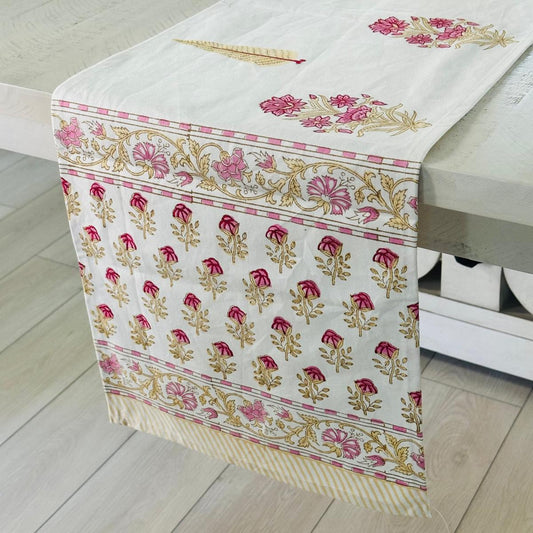 Floral patterned table runner on a white table