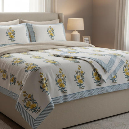 Bedroom with floral-patterned bedding and pillows